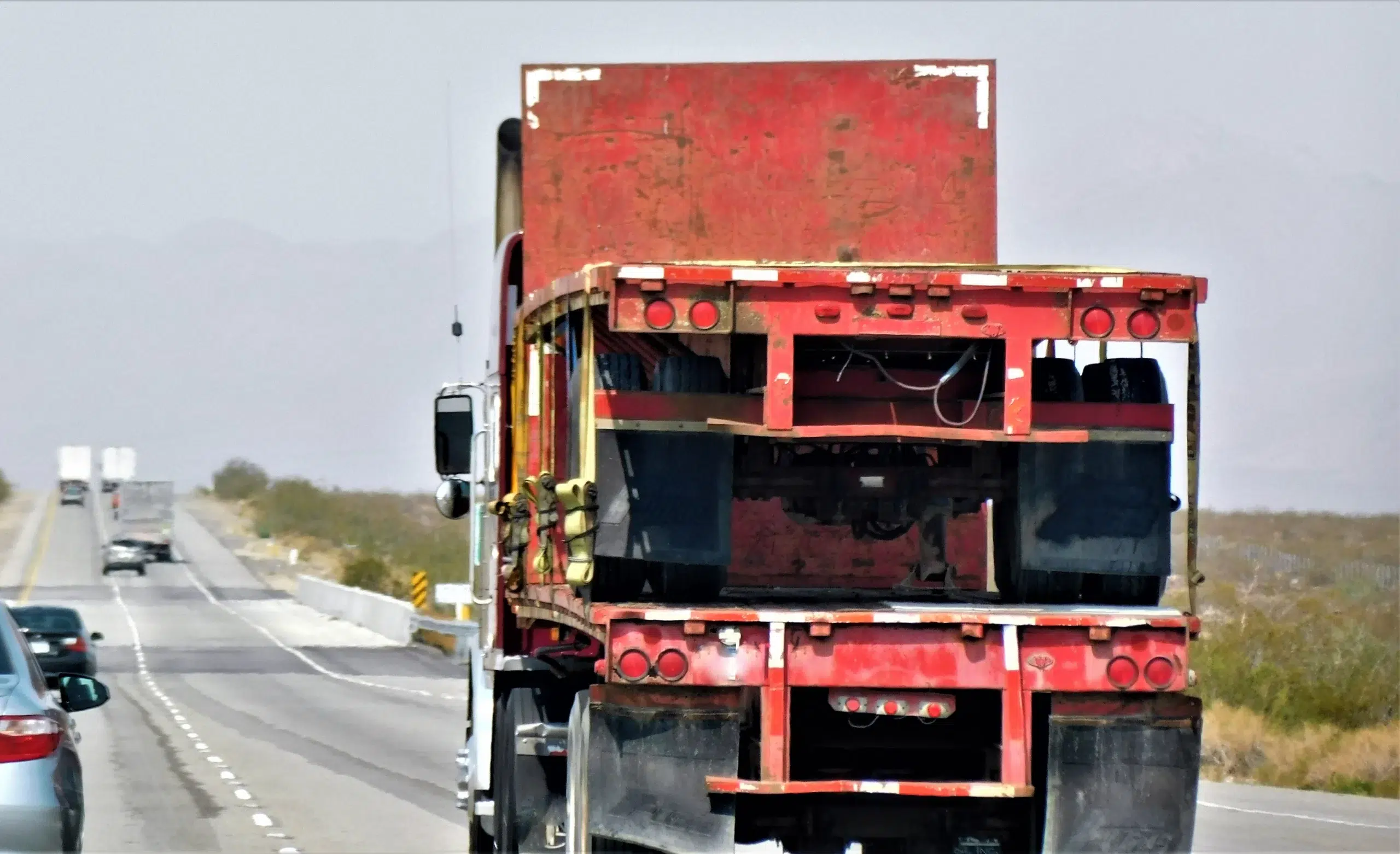 piggyback flat bed trailer on top of flat bed 18 wheeler